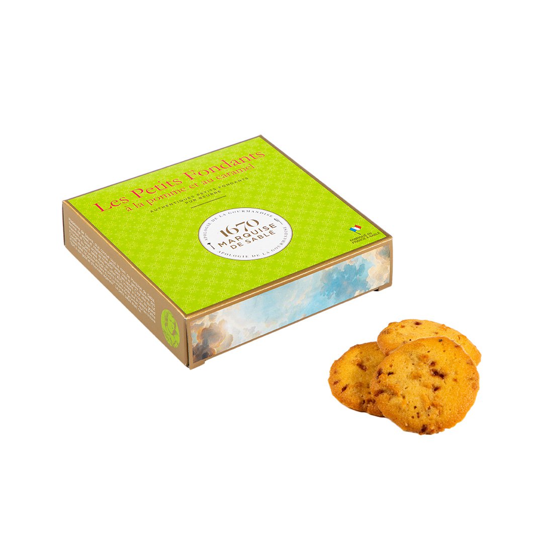 Box of 'Les Petits Fondants' cookies with two cookies on a white background