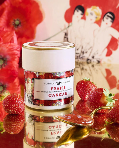 Jar of strawberry confiture with a decorative label on a colorful background