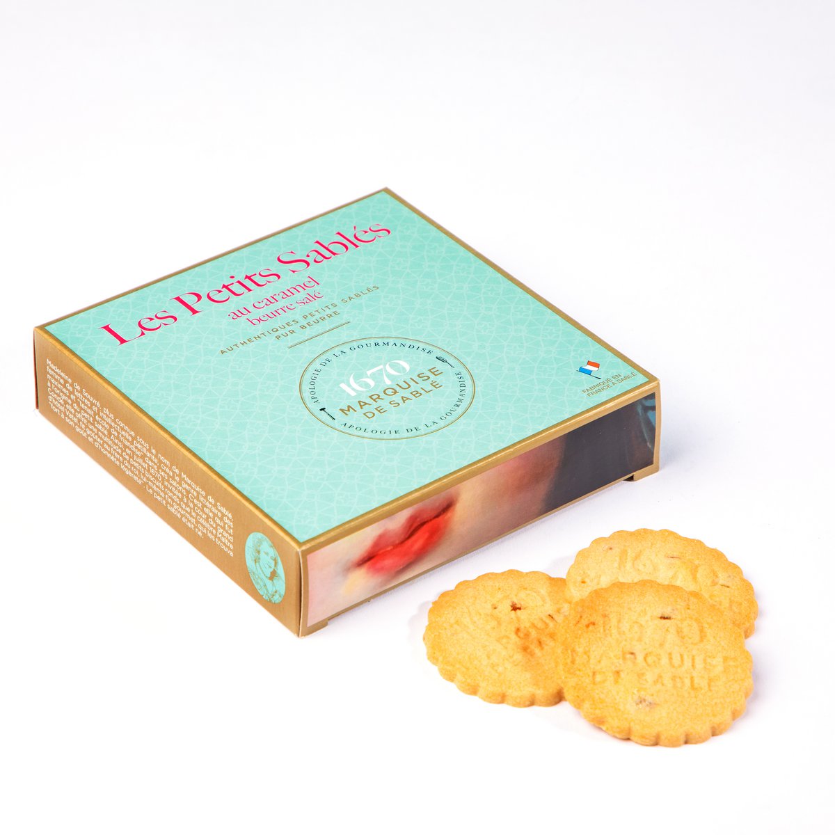 Box of 'Les Petits Sahès' cookies with two cookies on a white background